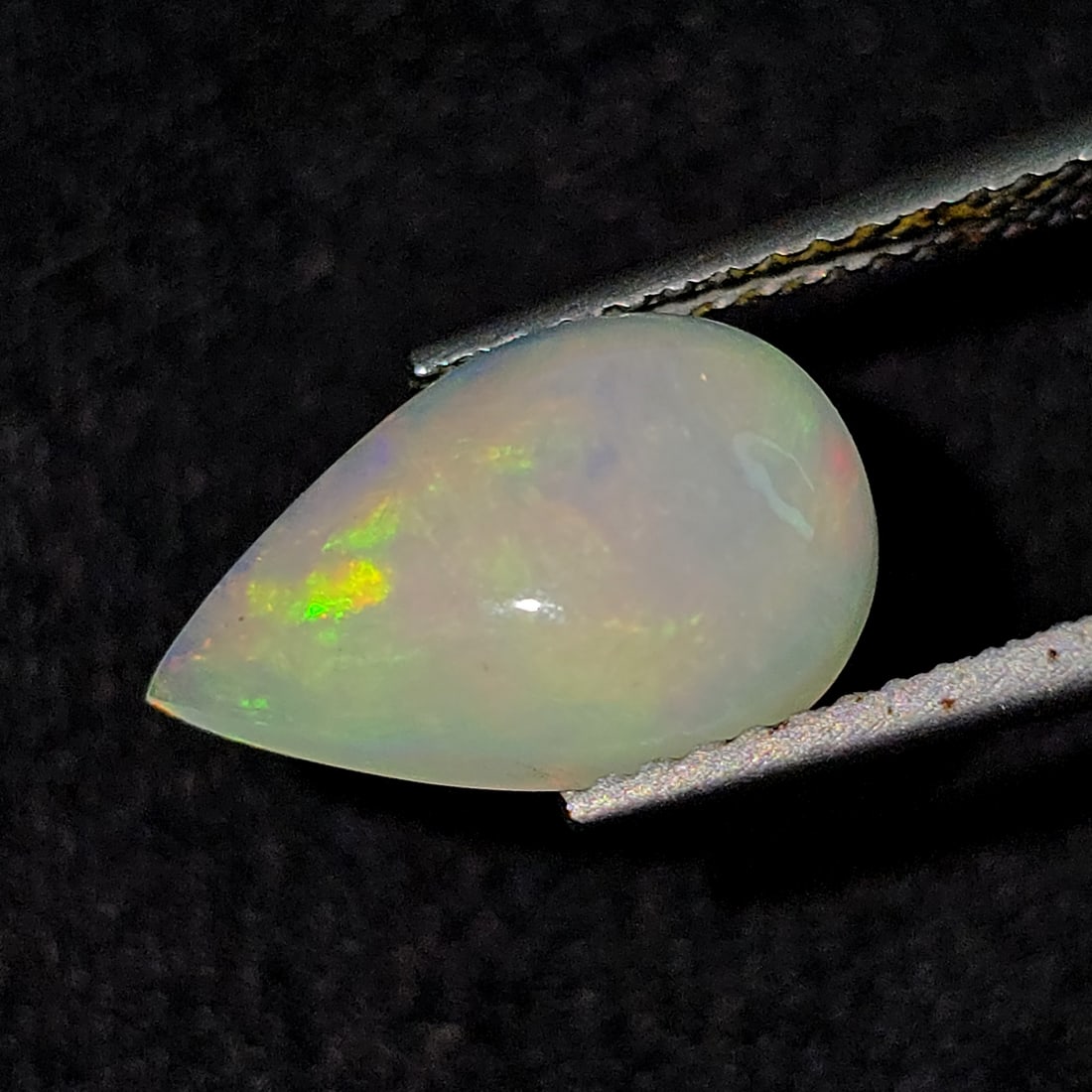 1.89 Ct Natural Ethiopian Fire Opal: Gemstones: Natural Fire Opal /Carat Weights: 1.89 ct /Size or Dimensions: 13 X 8.40 X 4 mm /Treatment: No