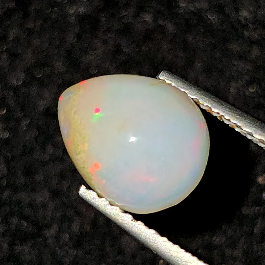 1.84 Ct Natural Ethiopian Fire Opal: Gemstones: Natural Fire Opal / Carat Weights: 1.84 ct /Size or Dimensions: 9.80 X 8 X 5 mm /Treatment: No
