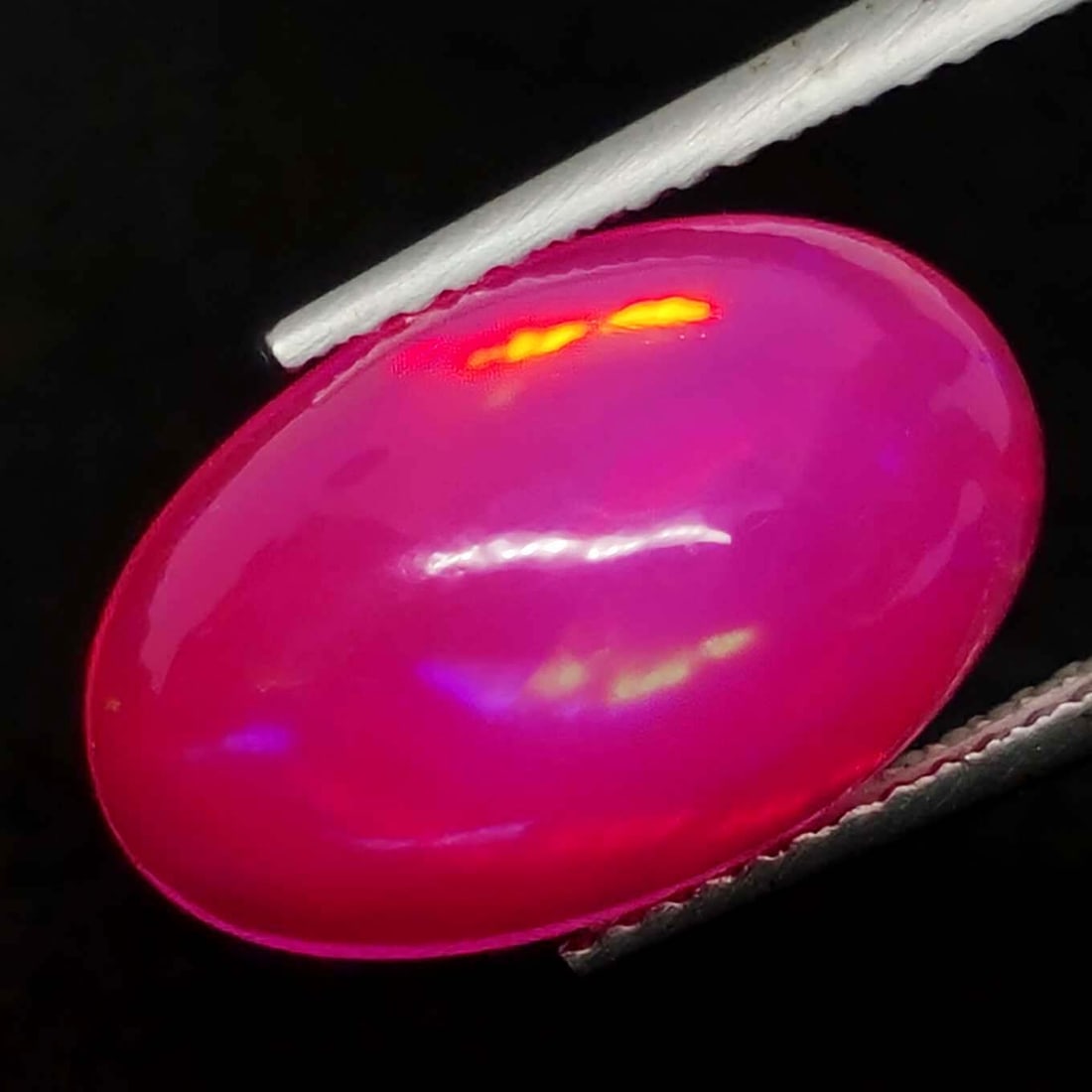 4.80 Ct Natural Ethiopian Pink Fire Opal: Gemstones: Natural Fire OpalCarat Weights: 4.80 ct Size or Dimensions: 16 X 10.40 X 6.30 mmTreatment: Color Dyed