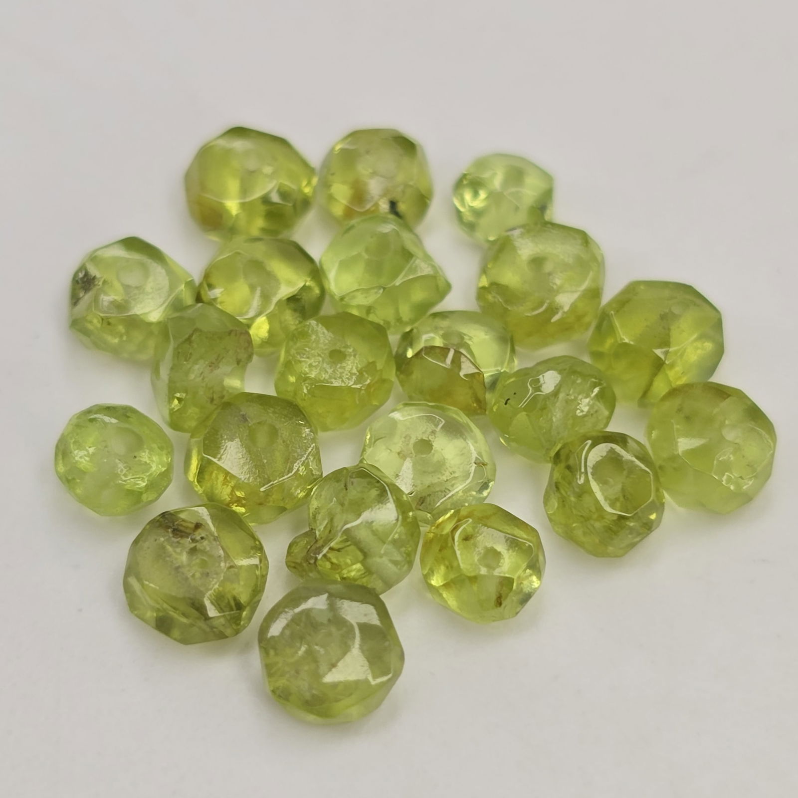 9.70 ct Natural Peridot Loose Beads: Gemstones: Natural Peridot /Carat Weights: 9.70 ct /Size or Dimensions: 4.00 to 4.50 mm Approx /Treatment: No