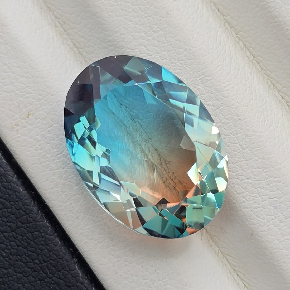 12.11 Ct "Beautiful"Aqua Terra Costa Doublet Quartz: "Gemstones: Natural Quartz /Carat Weights: 12.11 ct /Size or Dimensions: 18 X 13 mm Approx /Treatment: Doublet QuartzThis beautiful gemstone is crafted from two layers of natural quartz, forming a stu