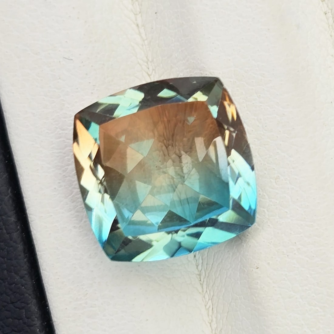 7.18 Ct "Beautiful"Aqua Terra Costa Doublet Quartz: "Gemstones: Natural Quartz /Carat Weights: 7.18 ct /Size or Dimensions: 12 X 12 mm Approx /Treatment: Doublet QuartzThis beautiful gemstone is crafted from two layers of natural quartz, forming a stun