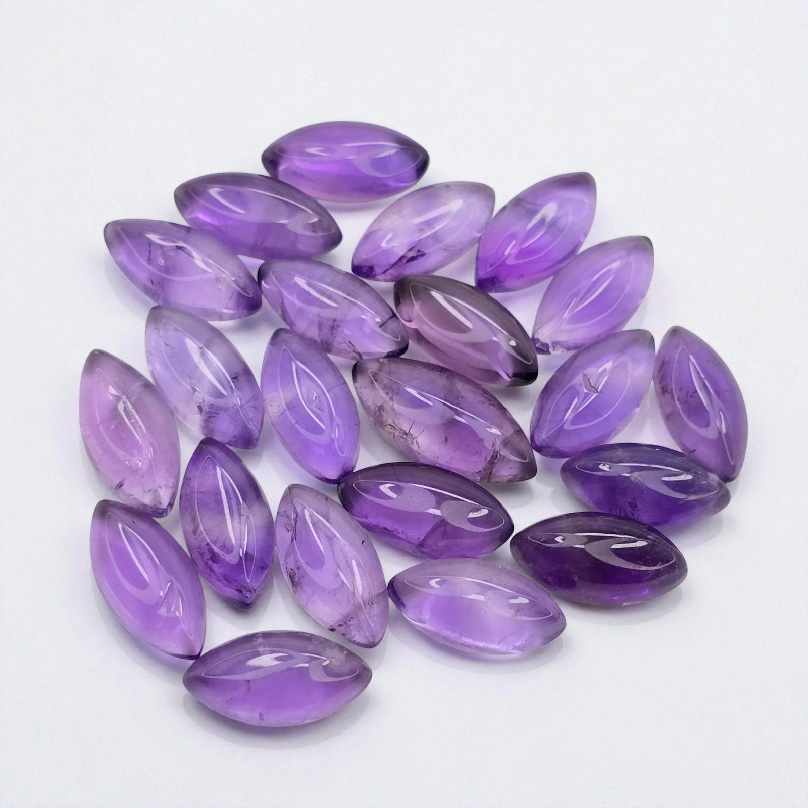 22 ct Natural African Amethyst Cab Marquise Set: Gemstones: Natural African Amethyst /Carat Weights: 22 ct /Size or Dimensions: 10 X 5 mm /Origin : Africa