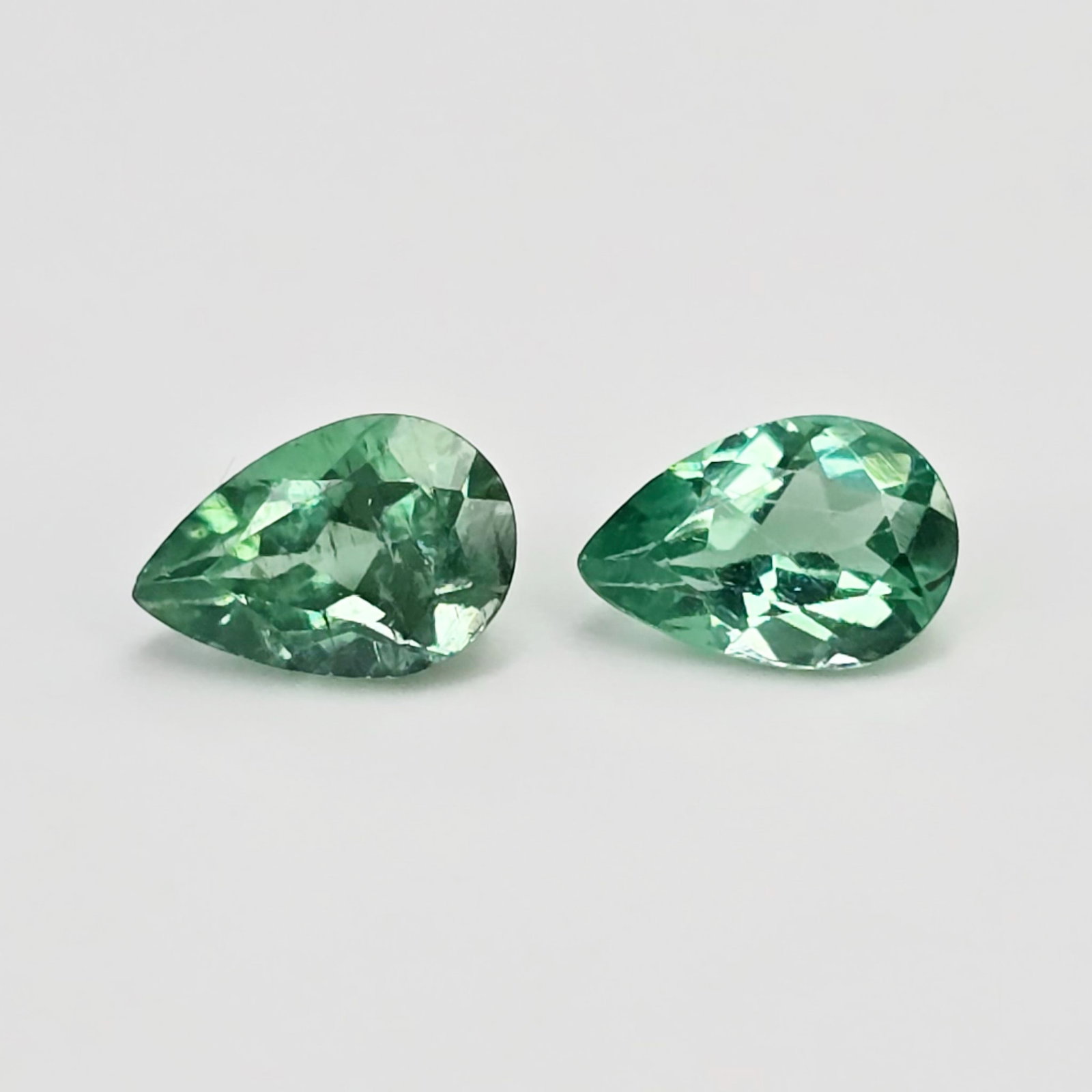 0.98 ct Natural Paraiba Neon Green Apatite Pair: Gemstones: Natural Neon Apatite /Carat Weights: 0.98 ct /Size or Dimensions: 6 X 4 mm Approx