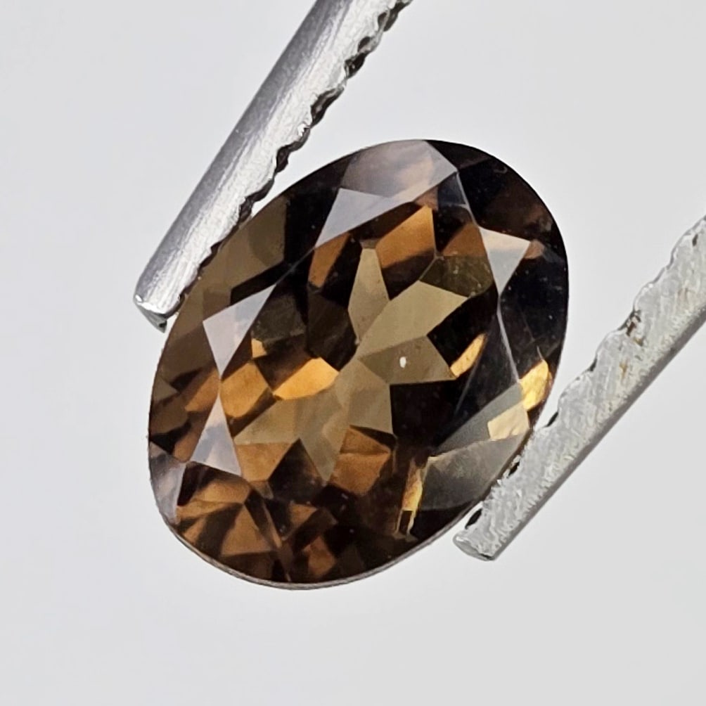 0.81 Ct "Play Of Colors" Natural Black Opal: Gemstones: Natural Black Fire Opal /Carat Weights: 0.81 ct /Size or Dimensions: 6.80 X 5 X 4 mmTreatment: Heated