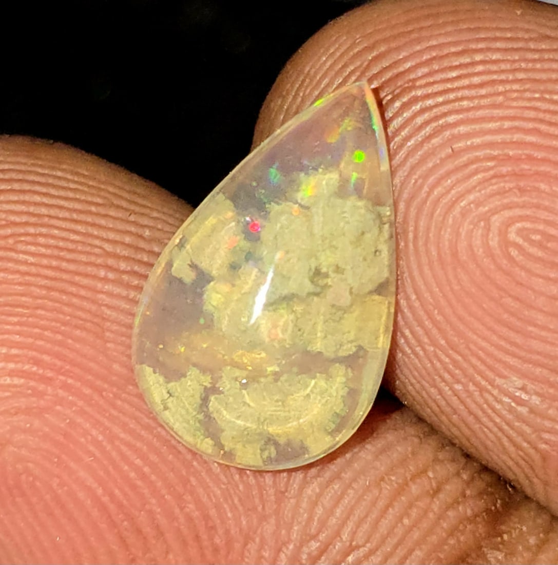 2.28 Ct Natural Ethiopian Fire Opal: Gemstones: Natural Fire Opal /Carat Weights: 2.28 ct /Size or Dimensions: 13.30 X 8.50 X 5 mm /Treatment: No