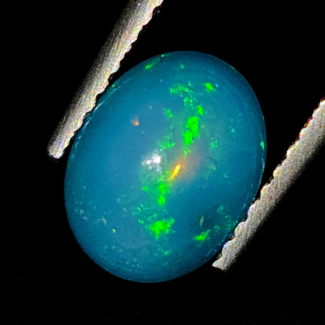 1.03 Ct Natural Ethiopian Green Fire Opal: Gemstones: Natural Fire Opal /Carat Weights: 1.03 ct /Size or Dimensions: 9 X 7 X 3.50 mm /Treatment: Color Dyed