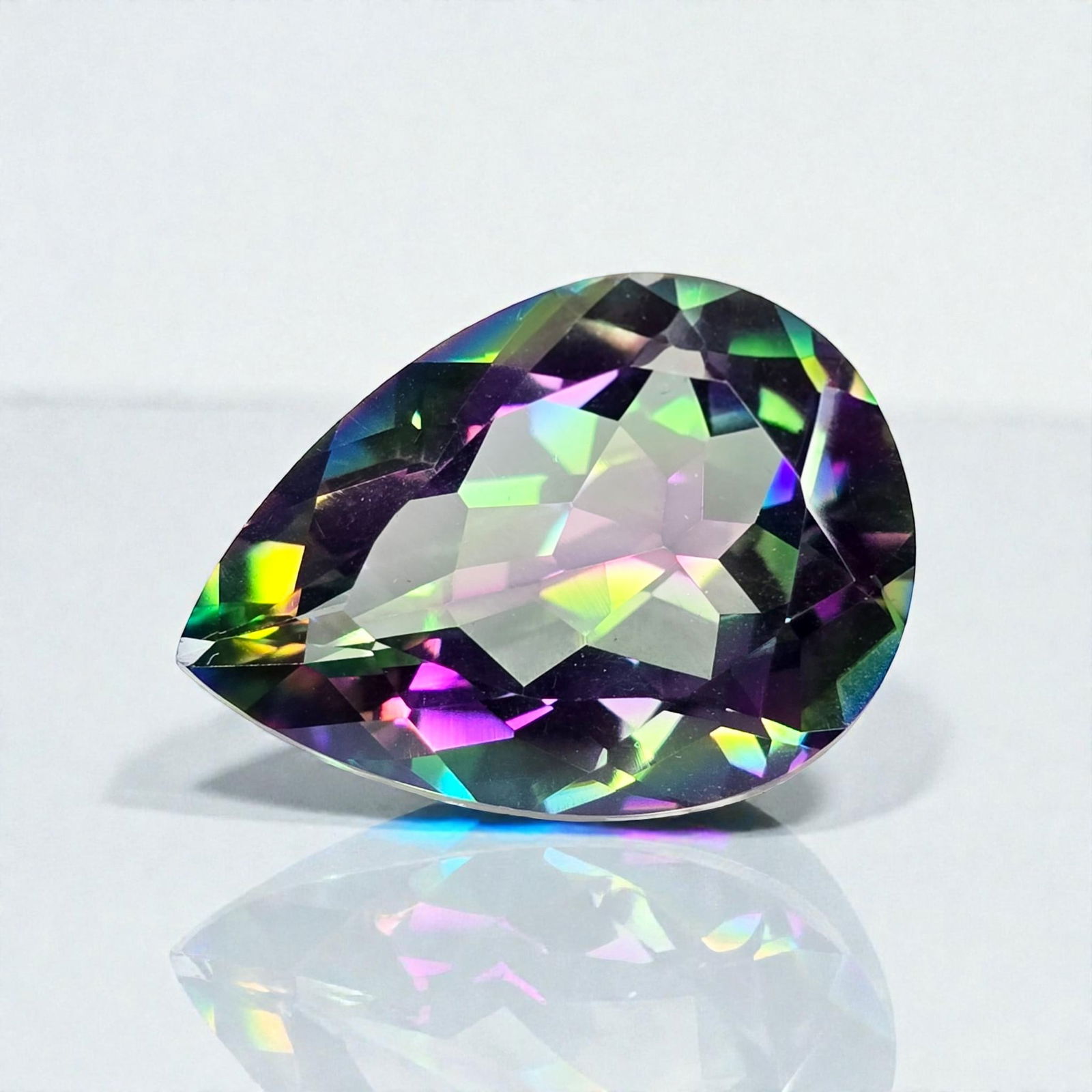 18.70 ct "Top Qulaity" Natural Rainbow Mystic Quartz: Gemstones: Natural Mystic Quartz /Carat Weights: 18.70 ct /Size or Dimensions: 22 X 16 X 10 mm /Treatment: Coated