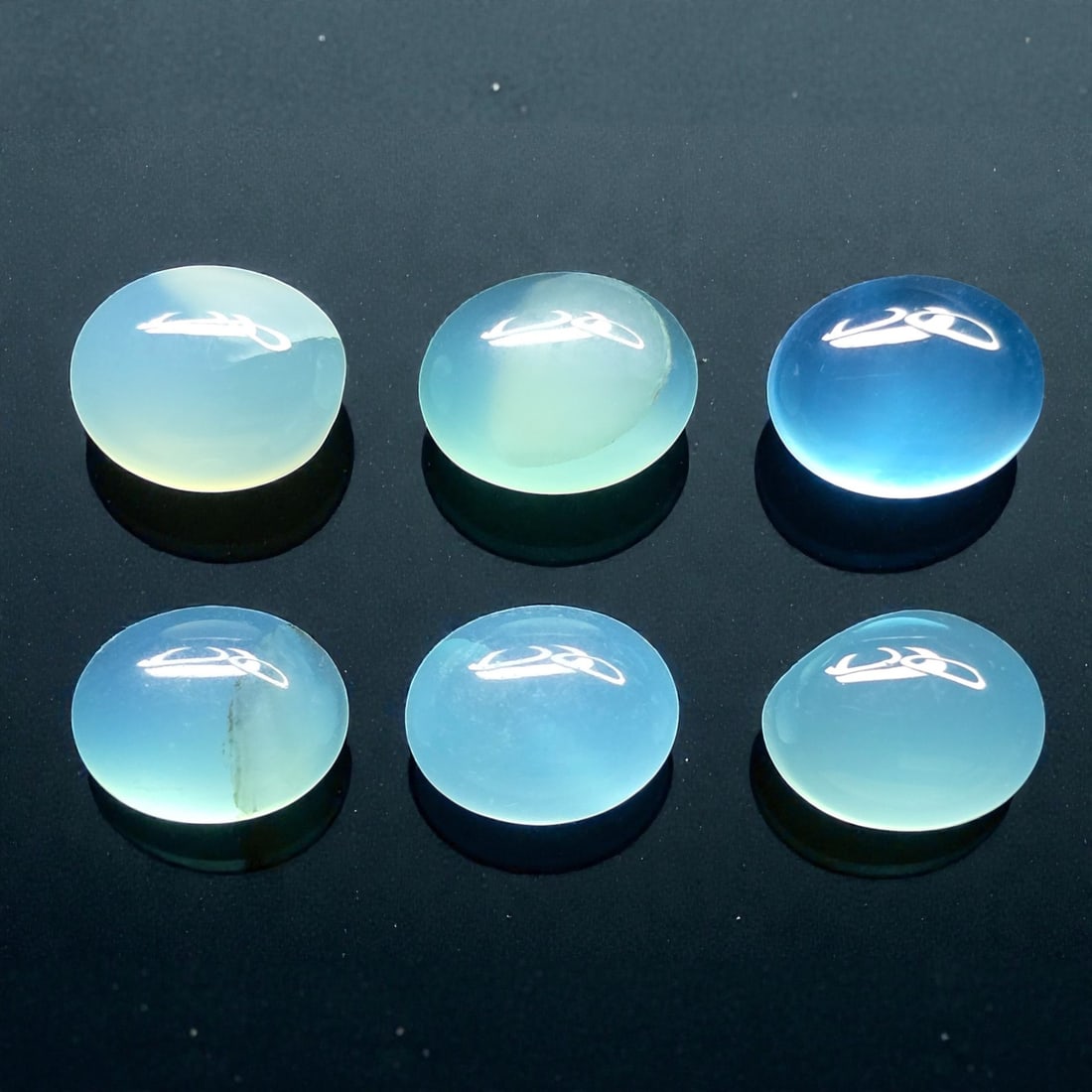 19.43 ct Natural Chalcedony Oval Set: Gemstones: Natual Chalcedony /Carat Weights: 19.43 ct /Size or Dimensions: 10 X 8 mm