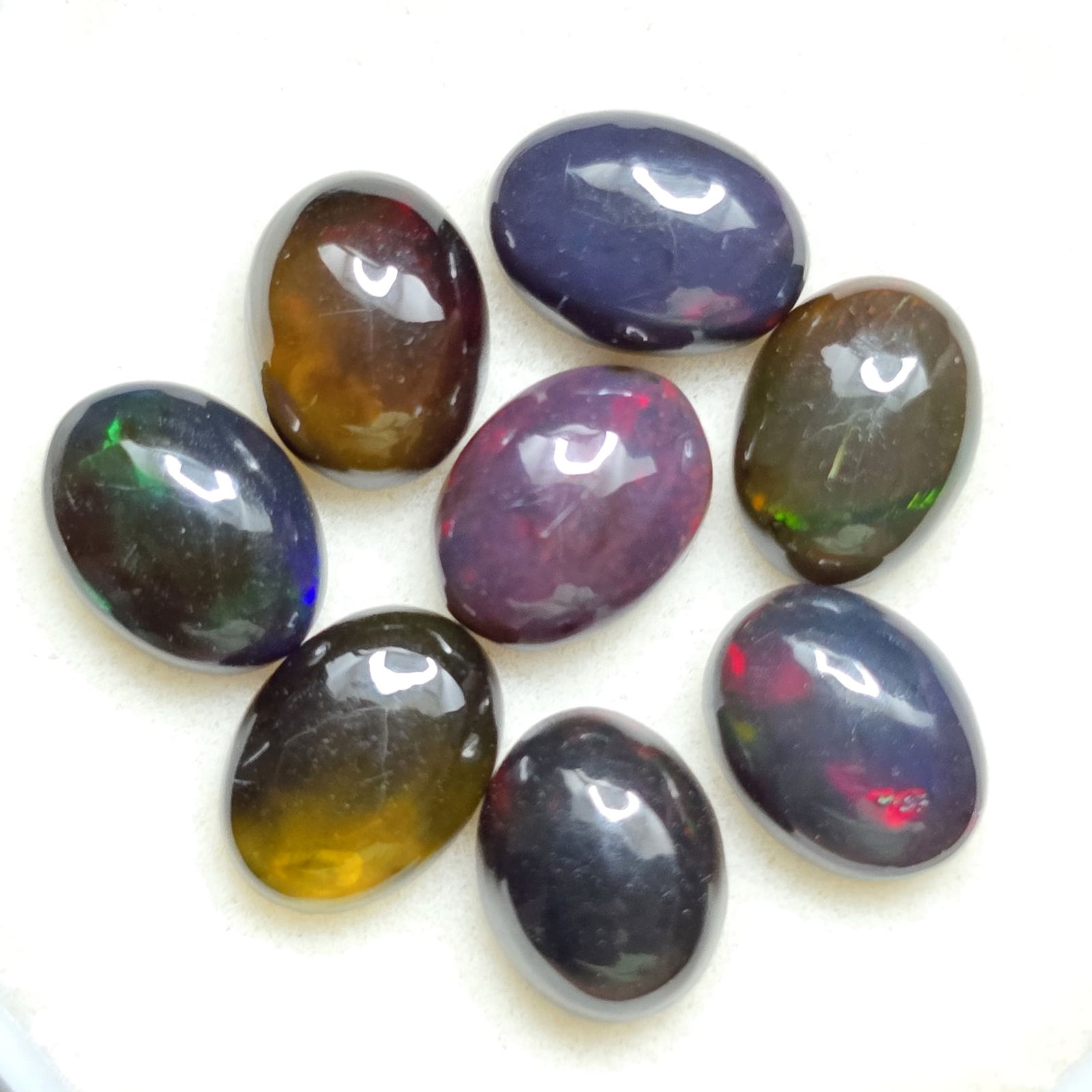 5.72 Ct "Play Of Colors" Natural Black Opal Set: Gemstones: Natural Black Fire Opal /Carat Weights: 5.72 ct /Size or Dimensions: 7.50 X 6 mm Approx /Treatment: Heated