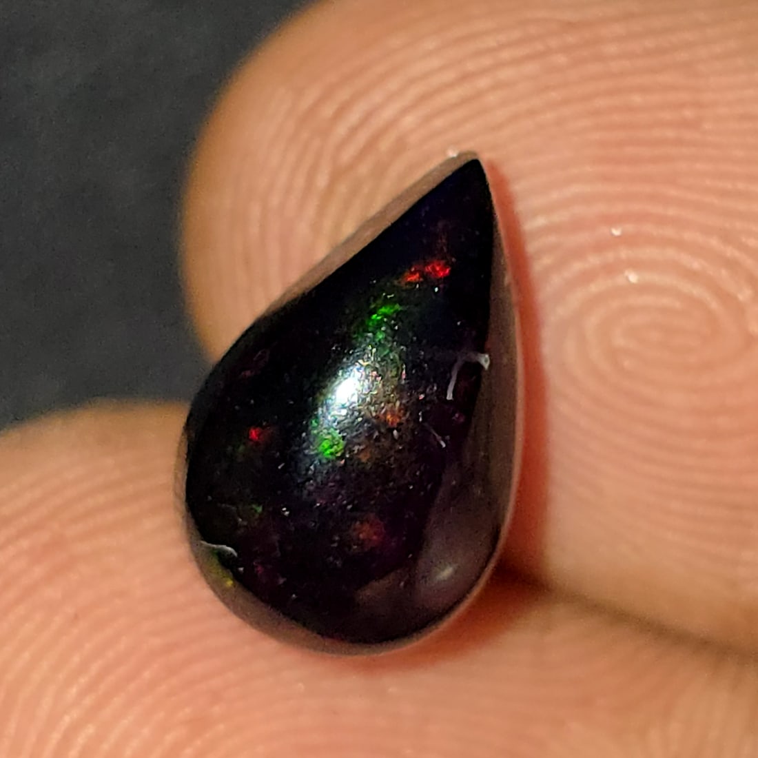 2.51 Ct "Play Of Colors" Natural Black Opal: Gemstones: Natural Black Fire Opal /Carat Weights: 2.51 ct /Size or Dimensions: 11 X 7 X 6 mm Approx /Treatment: Heated