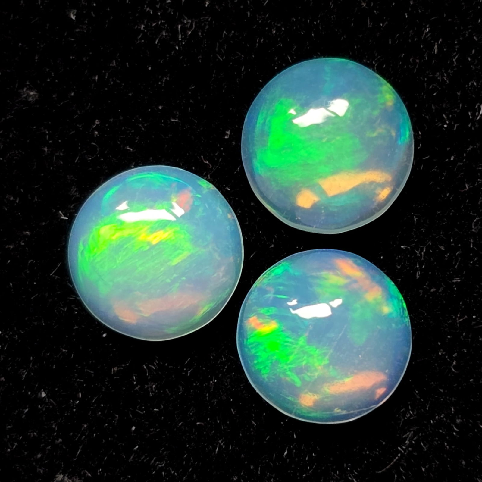 1.62 Ct "Play of Colors" Natural Ethiopian Fire Opal Set: Gemstones: Natural Fire Opal /Carat Weights: 1.62 ct /Size or Dimensions: 6 mm /Treatment: No