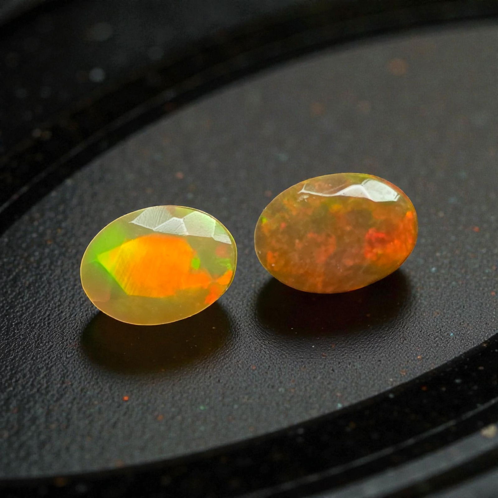 1.35 Ct "Play of Colors" Natural Ethiopian Fire Opal Pair: Gemstones: Natural Fire Opal /Carat Weights: 1.35 ct /Size or Dimensions: 7 X 5 mm /Treatment: No