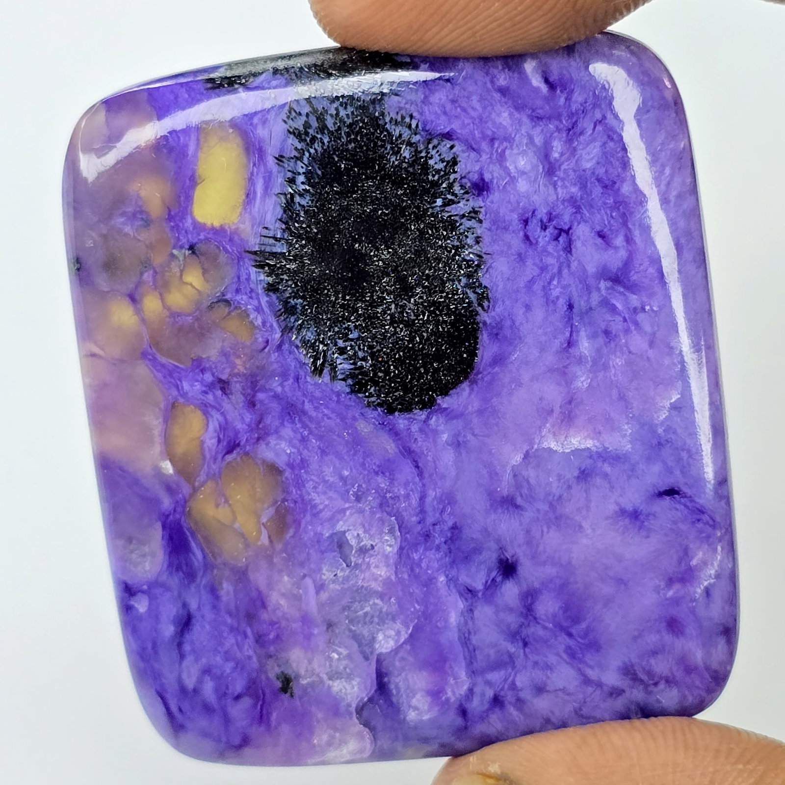 104.30 Ct Natural Deep Purple Charoite: Gemstones: Natural Charoite /Carat Weights: 104.30 ct /Size or Dimensions: 45 X 39 X 5 mm /Treatment: No