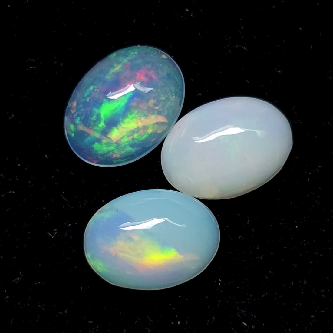 1.62 Ct "Play of Colors" Natural Ethiopian Fire Opal Set: Gemstones: Natural Fire Opal /Carat Weights: 1.62 ct /Size or Dimensions: 7 X 5 mm /Treatment: No