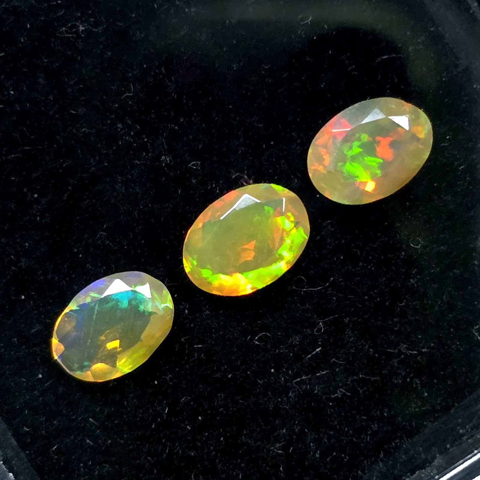 1.41 Ct "Play of Colors" Natural Ethiopian Fire Opal Cut Set: Gemstones: Natural Fire Opal /Carat Weights: 1.41 ct /Size or Dimensions: 7 X 5 mm /Treatment: No