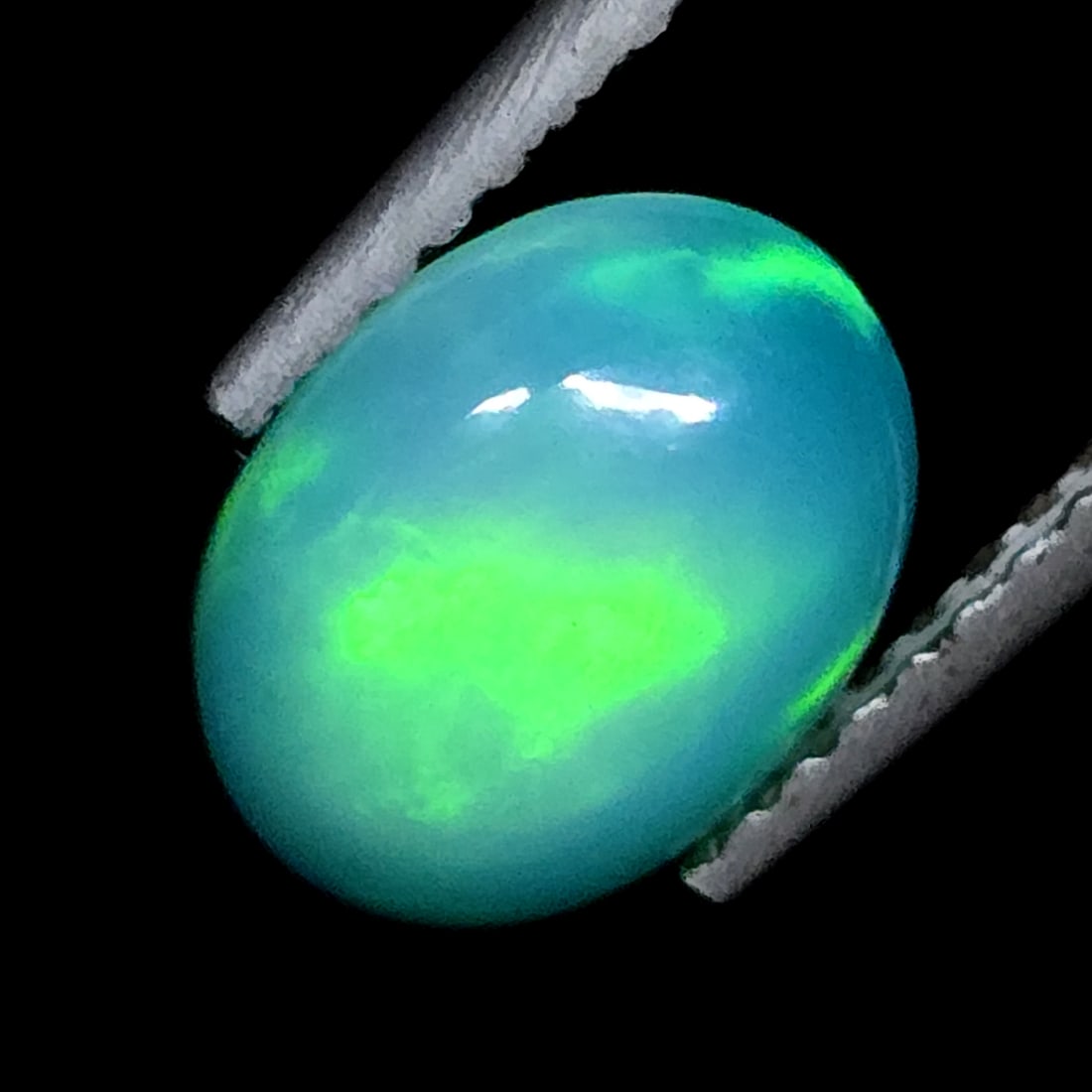 1.07 Ct Natural Ethiopian Green Fire Opal: Gemstones: Natural Fire Opal /Carat Weights: 1.07 ct /Size or Dimensions: 8.80 X 6.80 X 3.80 mm /Treatment: Color Dyed