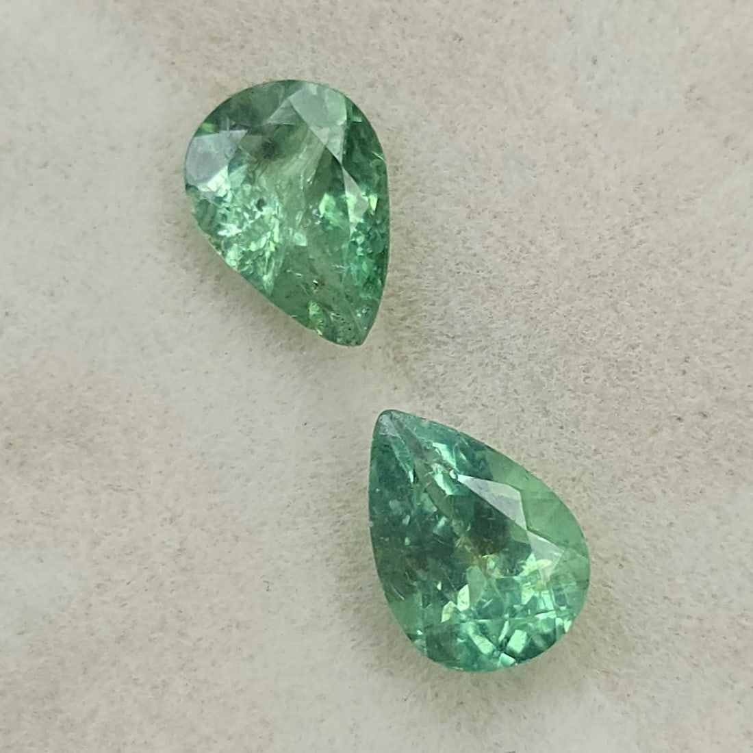 1.50 ct Natural Paraiba Neon Green Apatite Pair: Gemstones: Natural Neon Apatite /Carat Weights: 1.50 ct /Size or Dimensions: 7 X 5 mm Approx