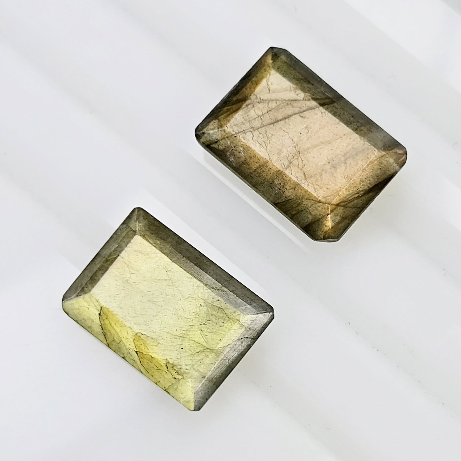11.72 Ct Natural Labradorite Faceted Pair: Gemstones: Natural LabradoriteCarat Weights: 11.72 ct Size/Dimensions: 14 X 10 mm ApproxTreatment: No