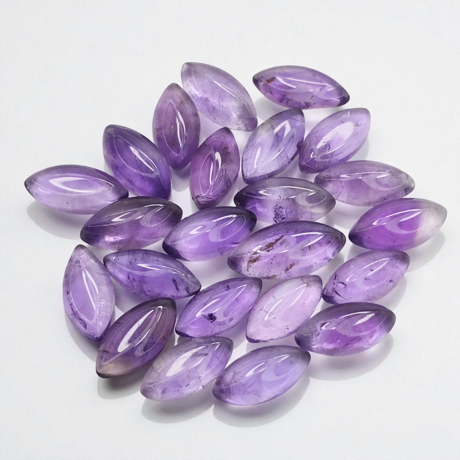 22.34 ct Natural African Amethyst Cab Marquise Set: Gemstones: Natural African Amethyst /Carat Weights: 22.34 ct /Size or Dimensions: 10 X 5 mm /Origin : Africa
