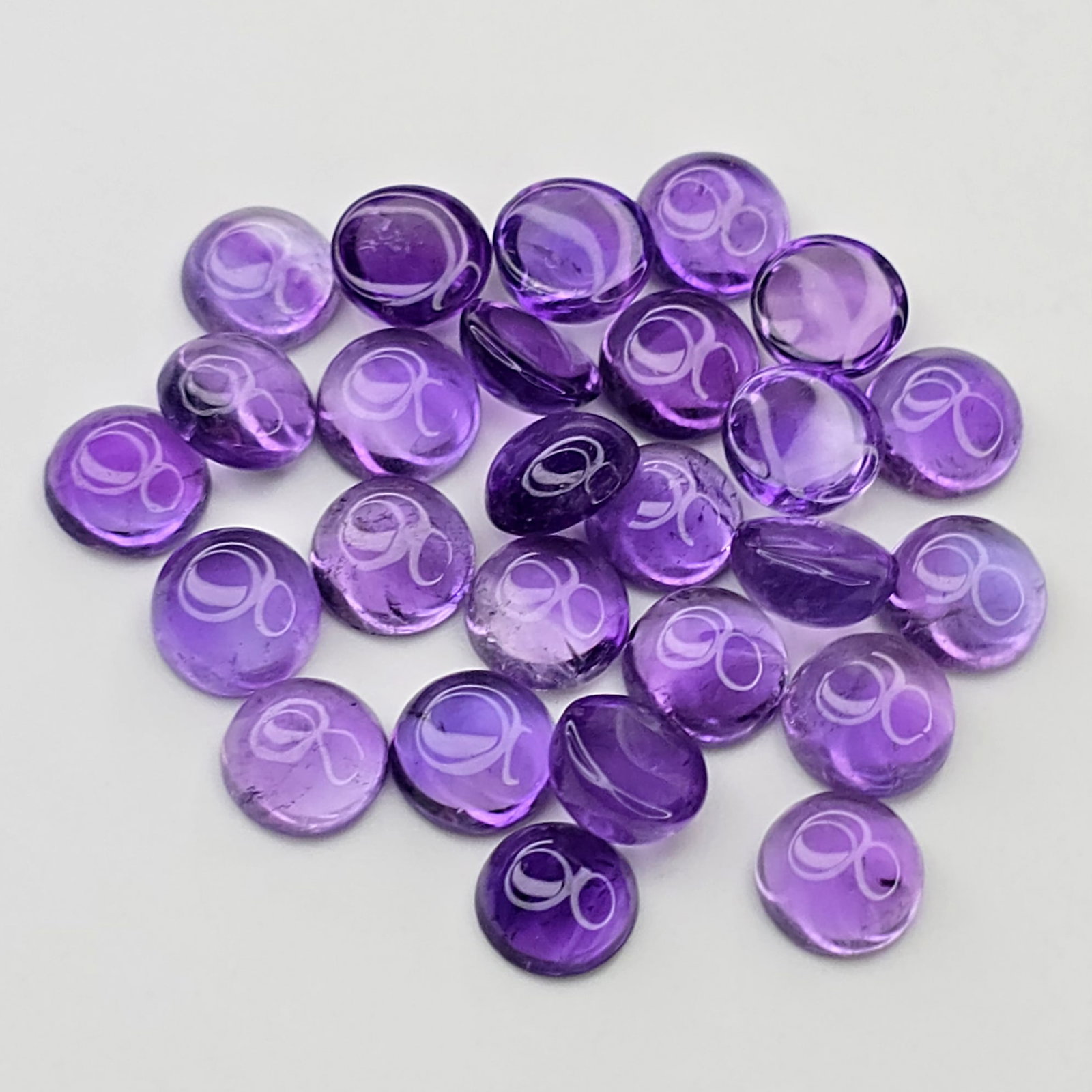 22.13 ct Natural African Amethyst Round Cab Set: Gemstones: Natural African Amethyst /Carat Weights: 22.13 ct /Size or Dimensions: 6 X 6 mm /Origin : Africa