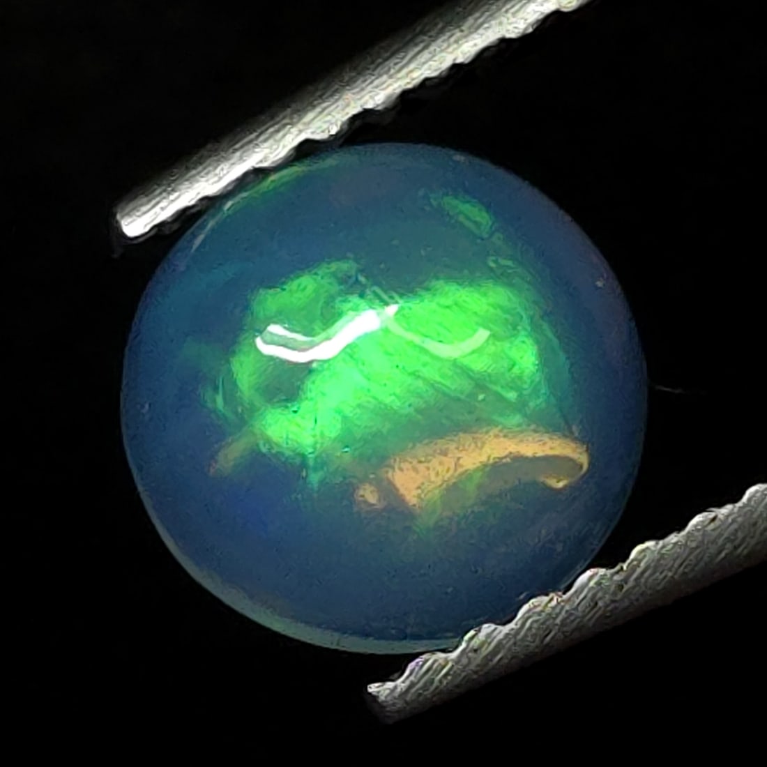 0.80 Ct "Play of Colors" Natural Ethiopian Fire Opal: Gemstones: Natural Fire Opal /Carat Weights: 1.61 ct /Size or Dimensions:7 X 7 X 3.30 mm /Treatment: No