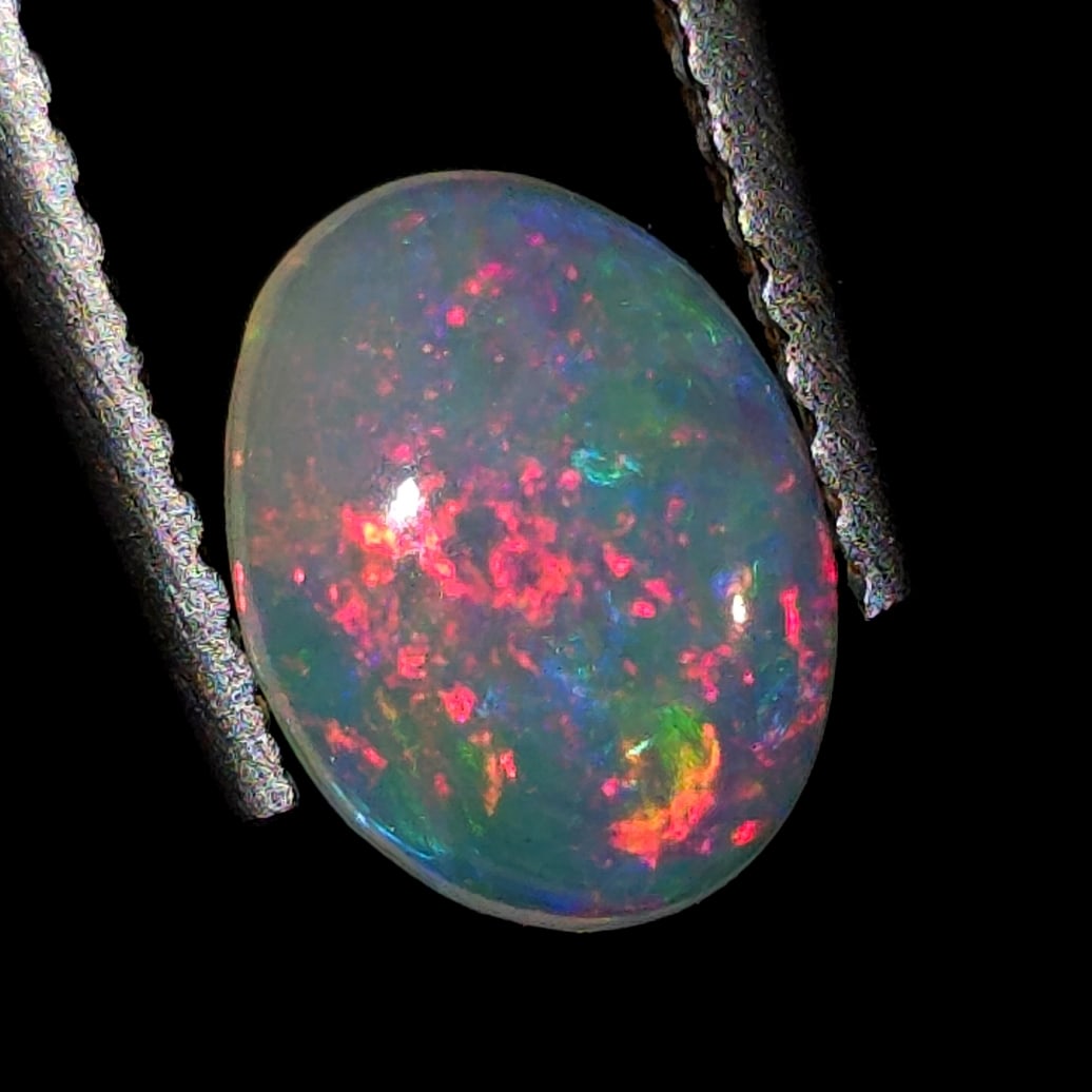 0.69 Ct "Play of Colors" Natural Ethiopian Fire Opal (1 of 7)