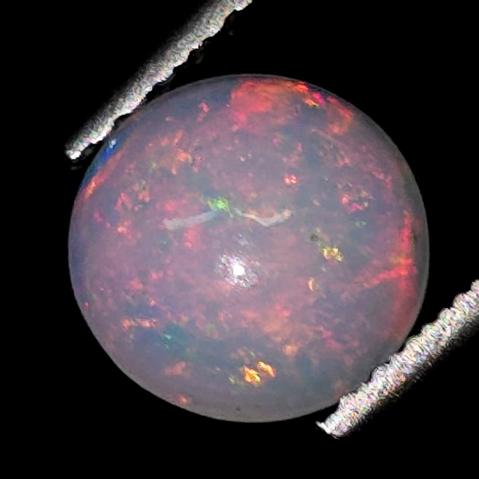 0.66 Ct "Play of Colors" Natural Ethiopian Fire Opal (1 of 6)