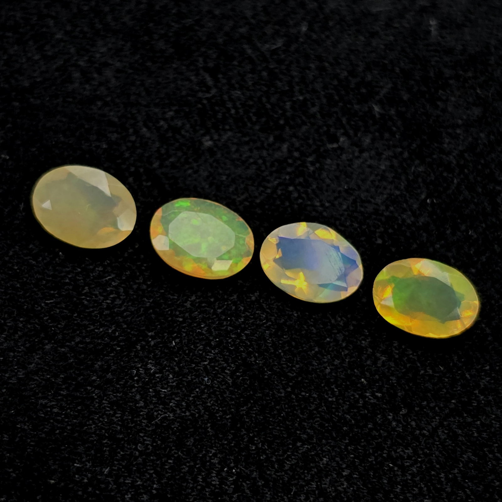 1.90 Ct "Play of Colors" Natural Ethiopian Fire Opal Set: Gemstones: Natural Fire Opal /Carat Weights: 1.90 ct /Size or Dimensions: 7 X 5 mm /Treatment: No