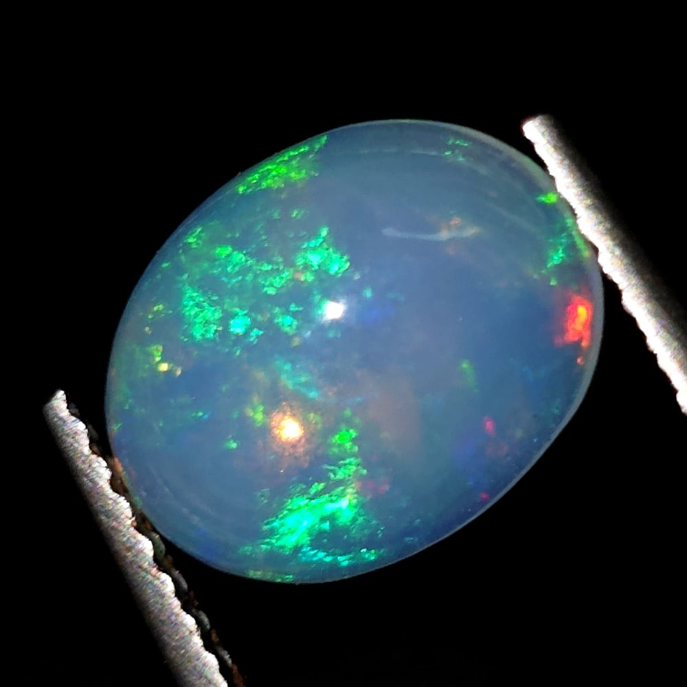 1.29 Ct "Play of Colors" Natural Ethiopian Fire Opal: Gemstones: Natural Fire Opal /Carat Weights: 1.29 ct /Size or Dimensions: 110 X 8 X 3.60 mm /Treatment: No