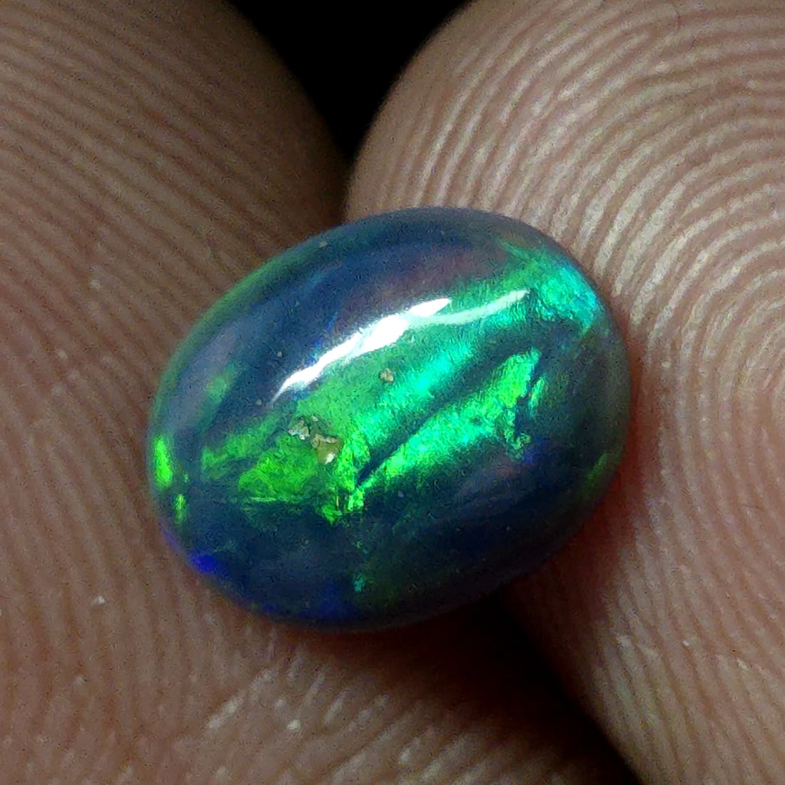 0.96 Ct Natural Ethiopian Green Fire Opal (1 of 5)
