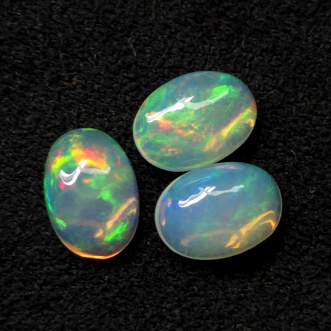 1.54 Ct "Play of Colors" Natural Ethiopian Fire Opal Set (1 of 2)