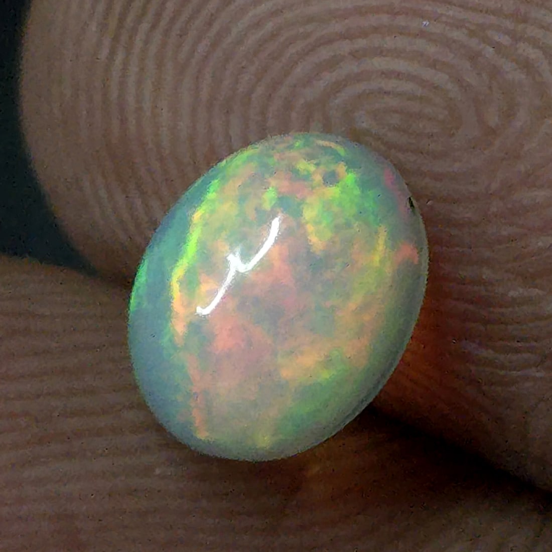 0.92 Ct Natural Ethiopian Fire Opal: Gemstones: Natural Fire Opal /Carat Weights: 0.92 ct /Size or Dimensions: 8 X 6 X 4 mm