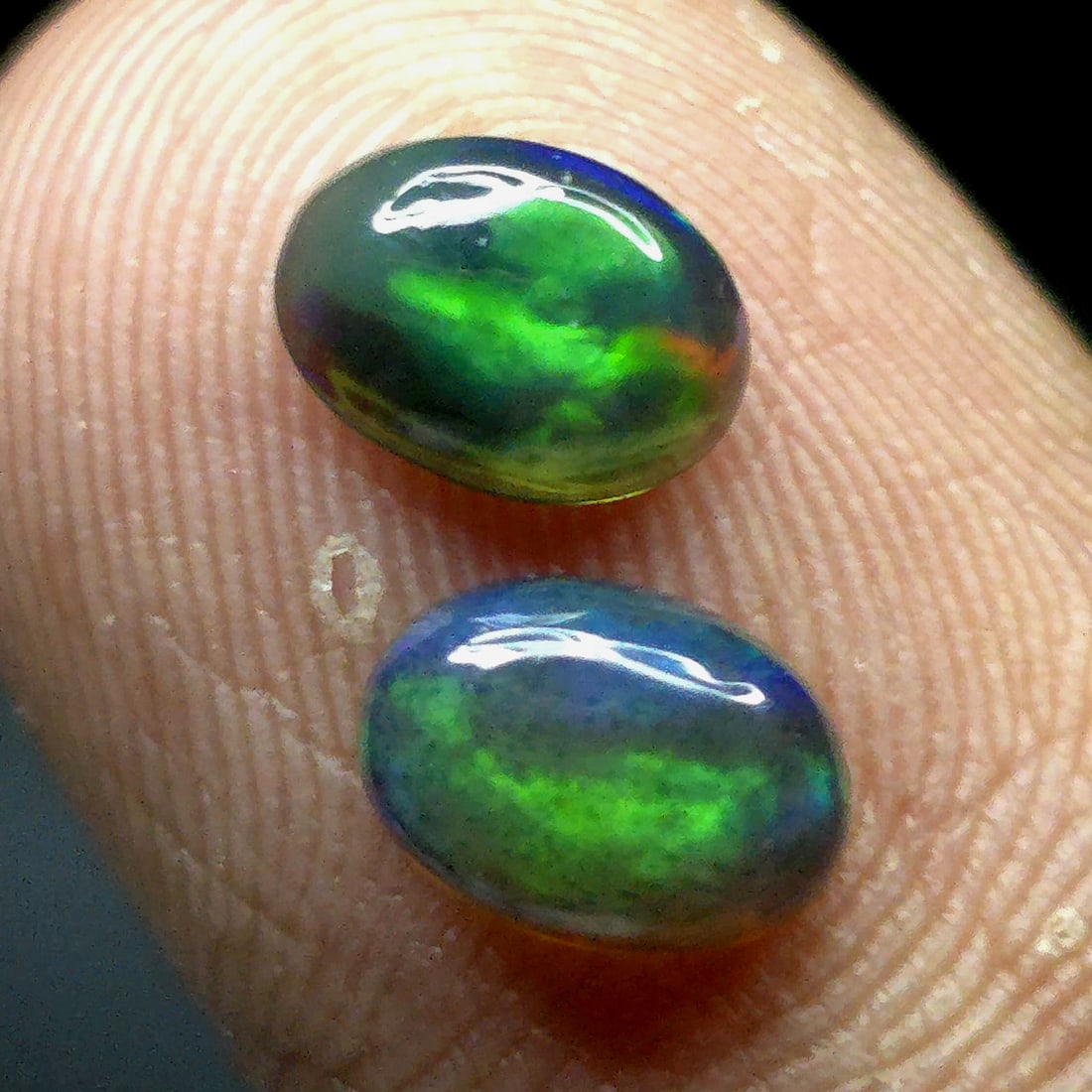 0.96 Ct Natural Ethiopian Green Fire Opal Pair: Gemstones: Natural Fire Opal /Carat Weights: 0.96 ct /Size or Dimensions: 7 X 5 mm /Treatment: Color Dyed