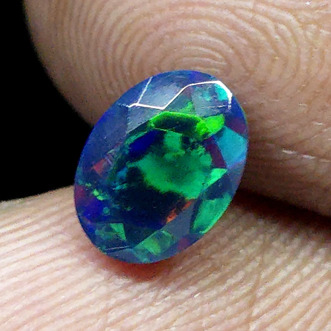 0.79 Ct "Play Of Colors" Natural Black Opal Cut: Gemstones: Natural Black Fire Opal /Carat Weights: 0.79 ct /Size or Dimensions: 8 X 6 X 4 mm Approx /Treatment: Heated