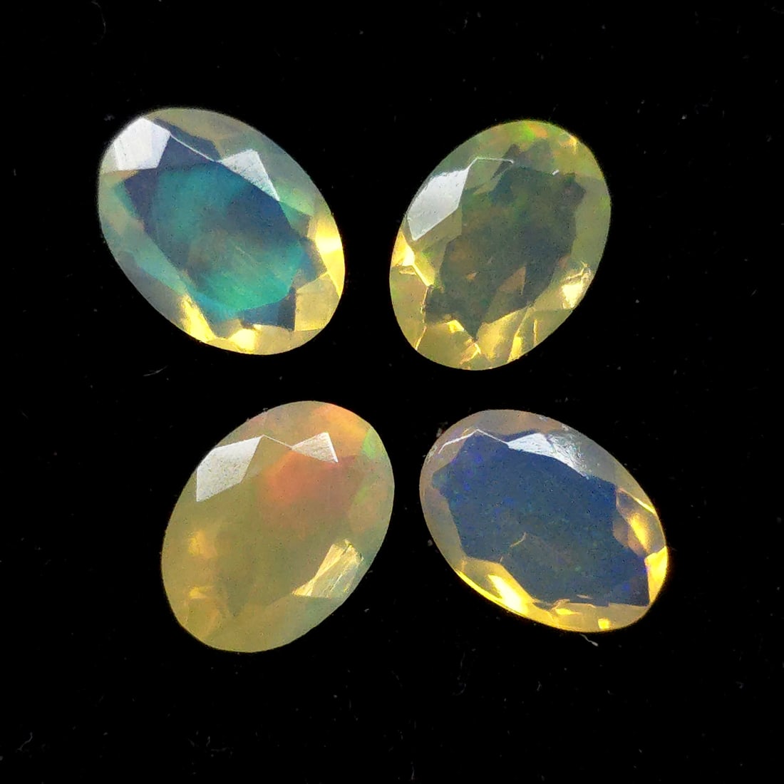 2.01 Ct Natural Ethiopian Fire Opal Set: Gemstones: Natural Fire Opal /Carat Weights: 2.01 ct /Size or Dimensions: 7 X 5 mm /Treatment: Color Dyed