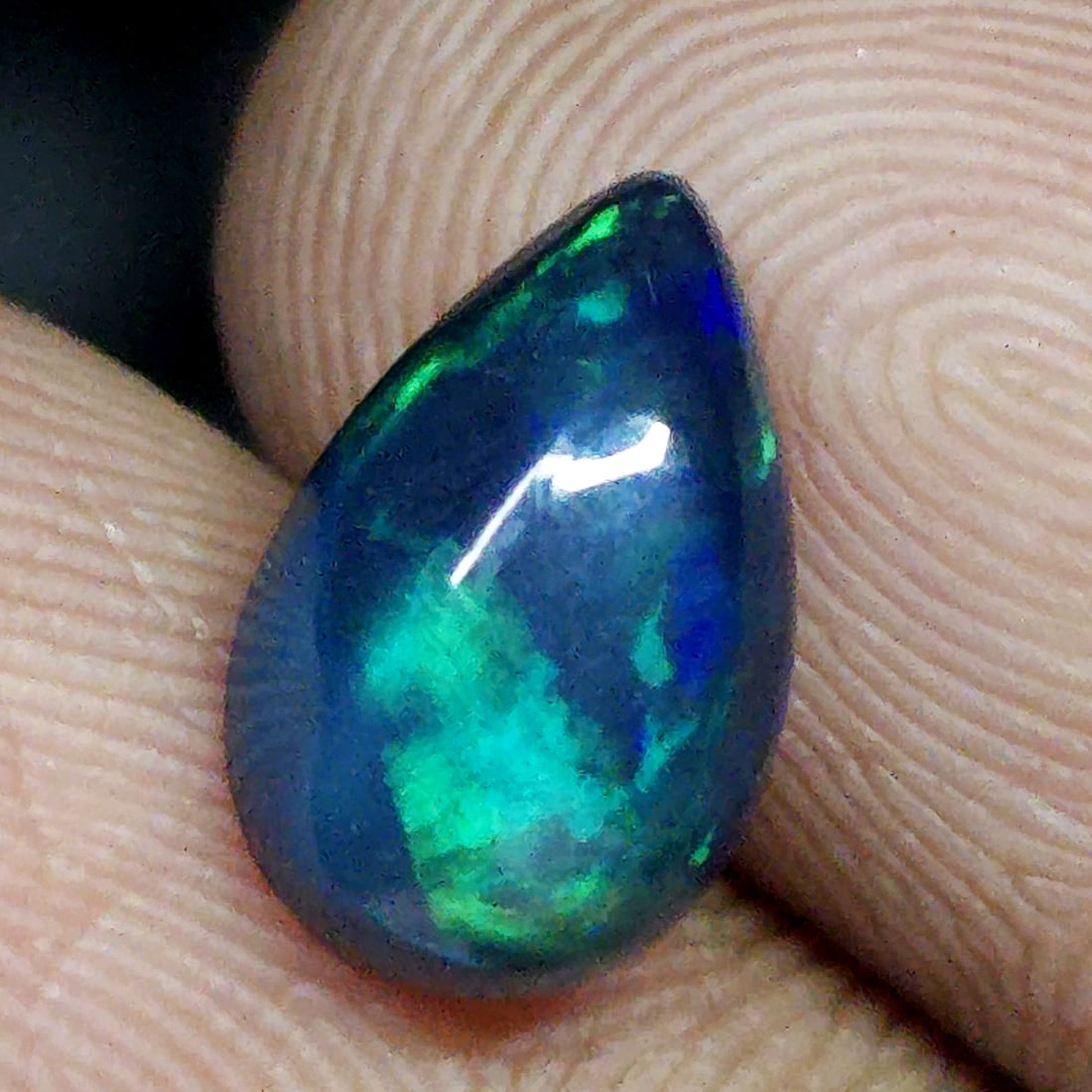 1.34 Ct "Play of Colors" Natural Black Fire Opal: Gemstones: Natural Fire Opal /Carat Weights: 1.34 ct /Size or Dimensions: 10.40 X 6.70 X 4 mm /Treatment: No