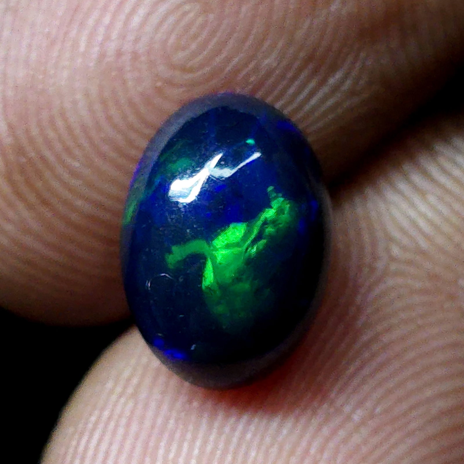 1.88 Ct "Play Of Colors" Natural Black Opal: Gemstones: Natural Black Fire Opal /Carat Weights: 1.88 ct /Size or Dimensions: 10 X 7 X 5 mm Approx /Treatment: Heated