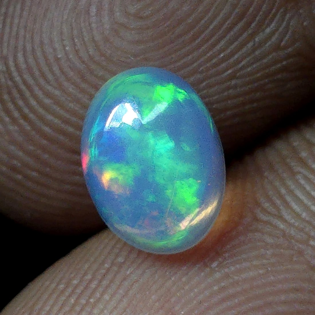 0.92 Ct "Play of Colors" Natural Ethiopian Fire Opal (1 of 5)