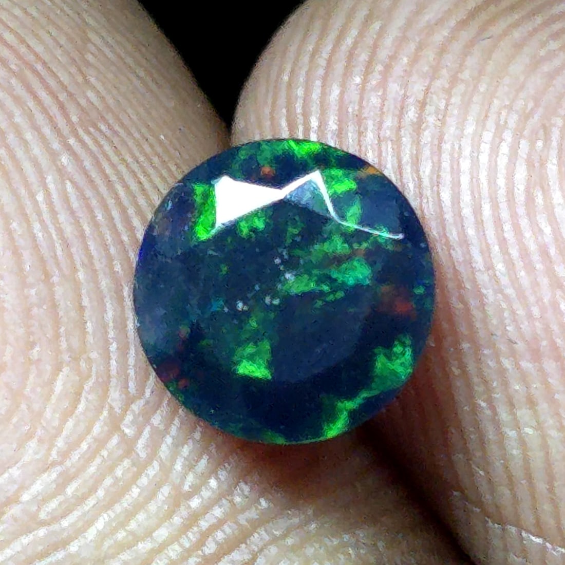 0.89 Ct "Play Of Colors" Natural Black Opal Cut: Gemstones: Natural Black Fire Opal /Carat Weights: 0.89 ct /Size or Dimensions: 7 X 7 mm Approx /Treatment: Heated