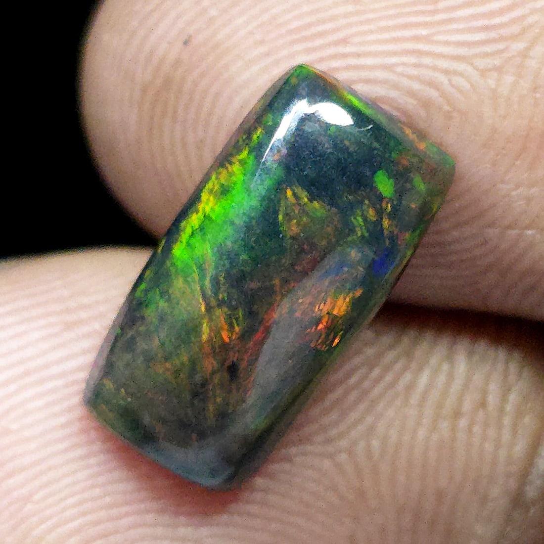 2.60 Ct "Play Of Colors" Natural Black Opal: Gemstones: Natural Black Fire Opal /Carat Weights: 2.60 ct /Size or Dimensions: 13.75 X 7.13 X 4.40 mm Approx /Treatment: Heated