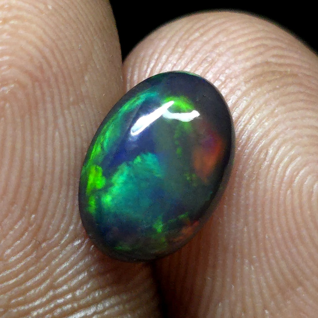 1.34 Ct "Play Of Colors" Natural Black Opal: Gemstones: Natural Black Fire Opal /Carat Weights: 1.34 ct /Size or Dimensions: 10 X 7 X 3.60 mm Approx /Treatment: Heated