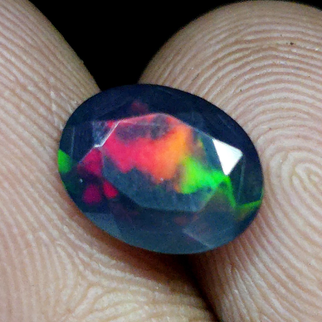 1.01 Ct "Play Of Colors" Natural Black Opal Cut: Gemstones: Natural Black Fire Opal /Carat Weights: 1.01 ct /Size or Dimensions: 9 X 7 X 3.80 mm Approx /Treatment: Heated