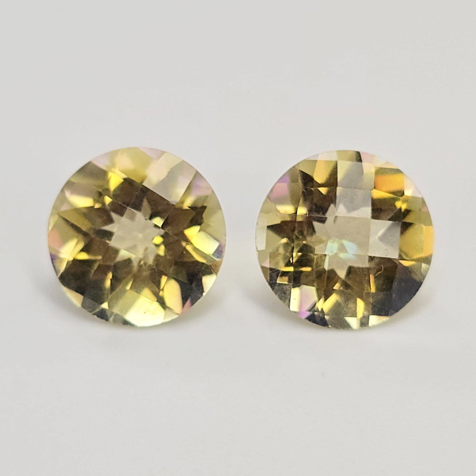 6.24 ct "Top Qulaity" Natural Yellow Mystic Quartz Pair: Gemstones: Natural Mystic Quartz /Carat Weights: 6.24 ct /Size or Dimensions: 12 X 10 mm /Treatment: Coated