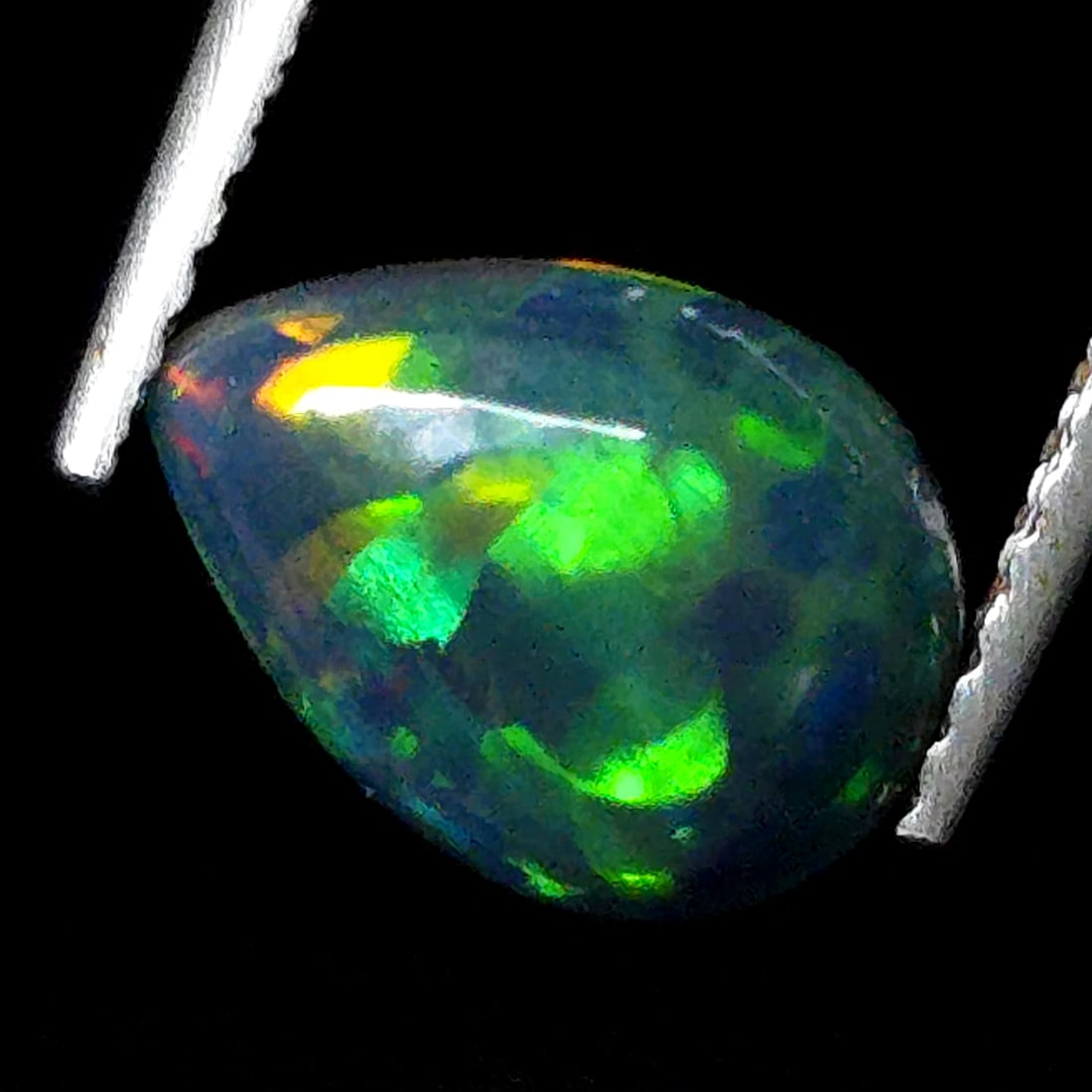 1 Ct "Play Of Colors" Natural Black Opal: Gemstones: Natural Black Fire Opal /Carat Weights: 1 ct /Size or Dimensions: 9.80 X 7 mm Approx /Treatment: Heated