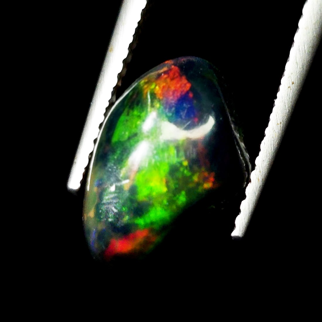 2.39 Ct "Play Of Colors" Natural Black Opal: Gemstones: Natural Black Fire Opal /Carat Weights: 2.39 ct /Size or Dimensions: 13 X 8.30 X 4.70 mm Approx /Treatment: Heated