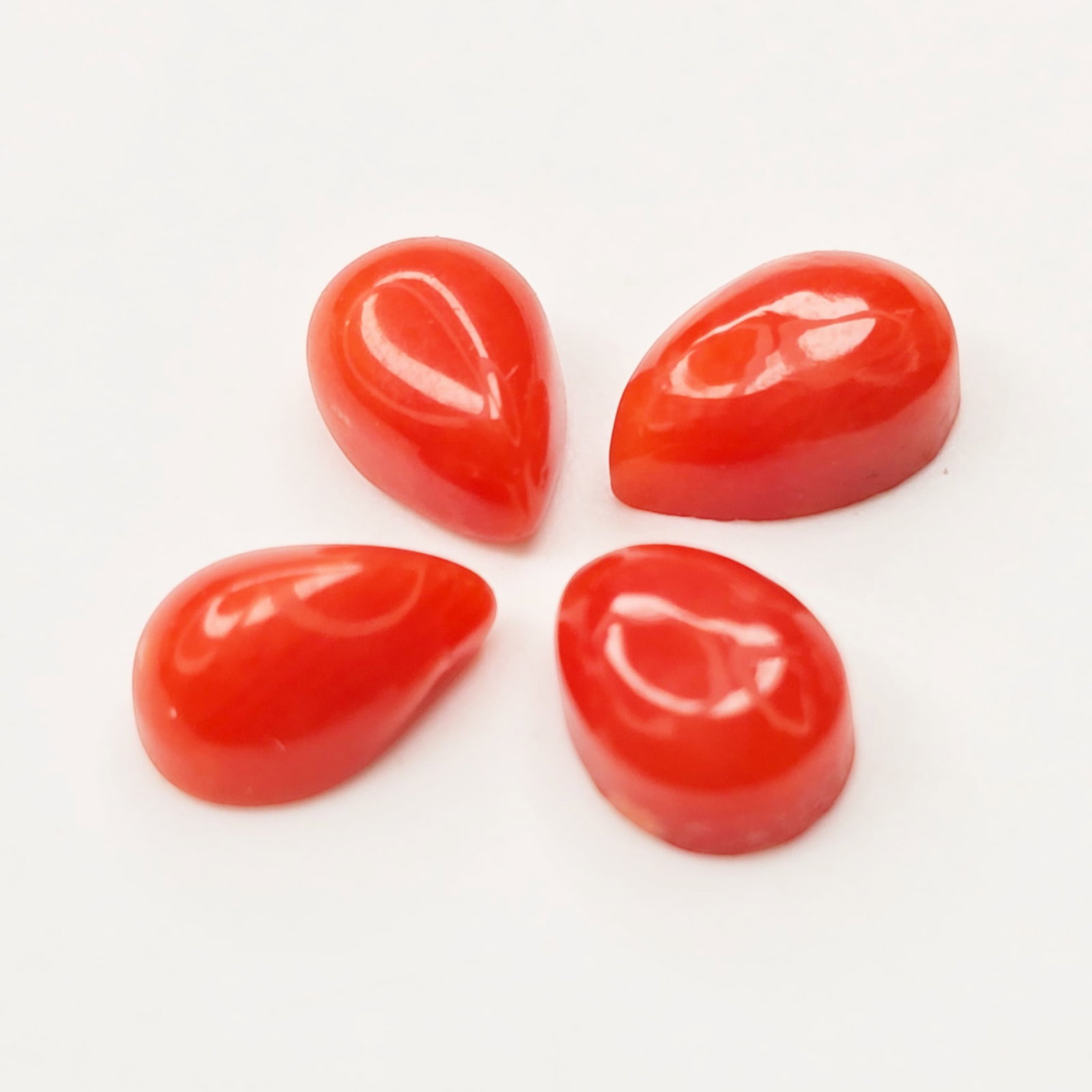 2 ct Natural Red Coral Pear Set: Gemstones: Natural Red Coral /Carat Weights: 2 ct /Size or Dimensions: 6 X 4 mm