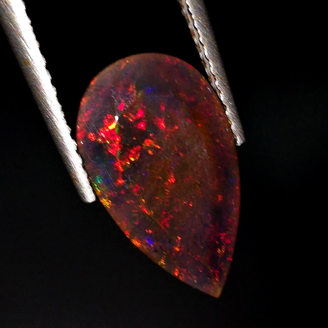 1.50 Ct "Play Of Colors" Natural Black Opal: Gemstones: Natural Black Fire Opal /Carat Weights:1.50 ct /Size or Dimensions: 9 X 6.50 X 4.30 mm Approx /Treatment: Heated
