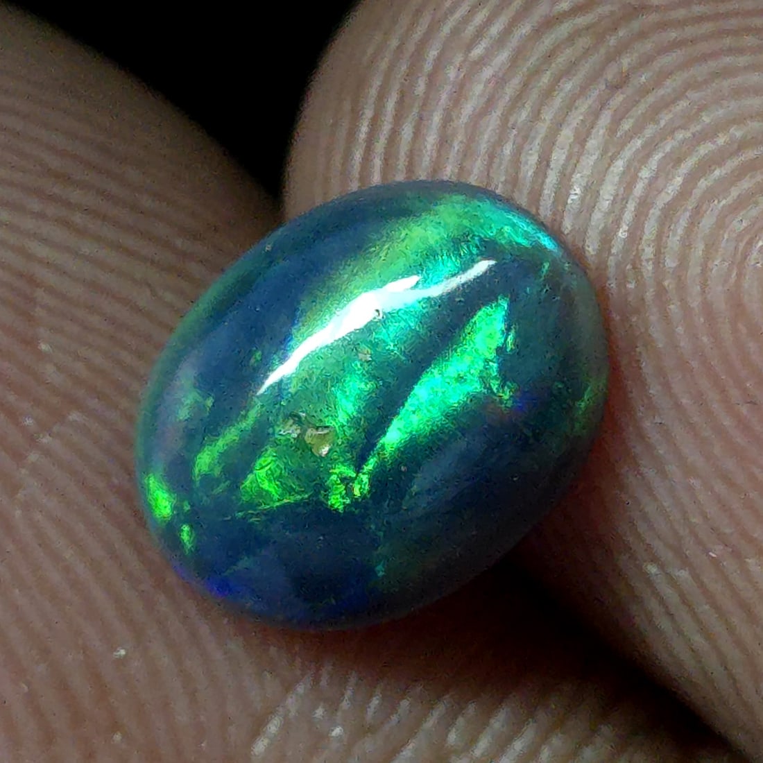 0.96 Ct Natural Ethiopian Green Fire Opal: Gemstones: Natural Fire Opal /Carat Weights: 0.96 ct /Size or Dimensions: 9 X 7 X 3 mm /Treatment: Color Dyed