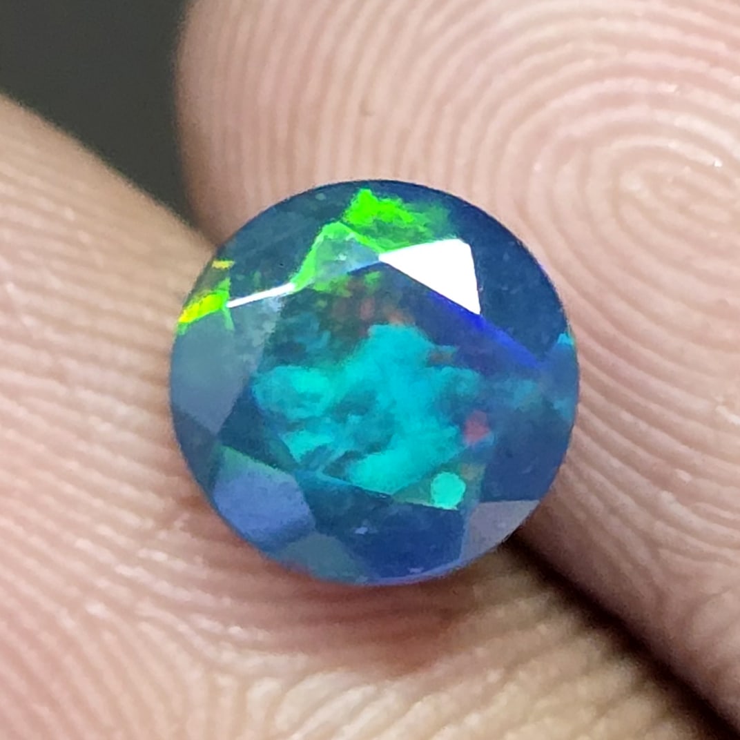 1.13 Ct "Play Of Colors" Natural Black Opal Cut: Gemstones: Natural Black Fire Opal /Carat Weights: 1.13 ct /Size or Dimensions: 7 mm Approx /Treatment: Heated